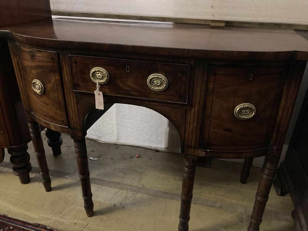 A Regency ebony inlaid mahogany bow front sideboard, width 122cm, depth 57cm, height 89cm